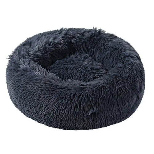 Dog relaxing in the ZenHound calming donut bed